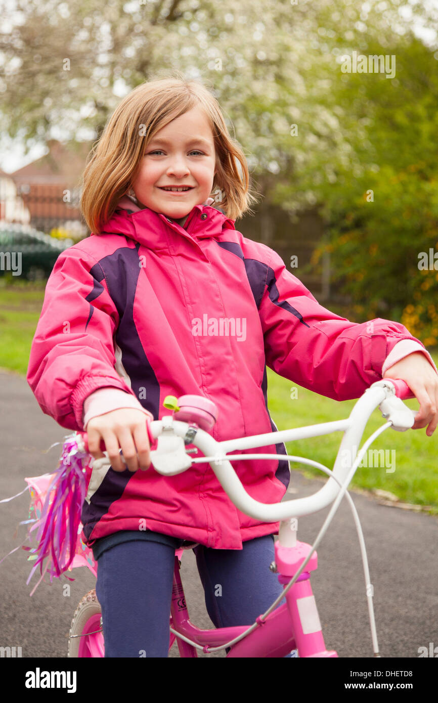 Girl on bicycle Stock Photo