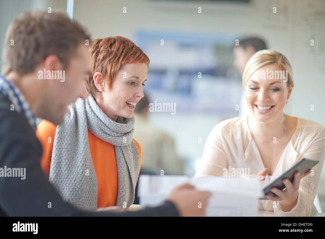 Businesspeople looking at digital tablet Stock Photo