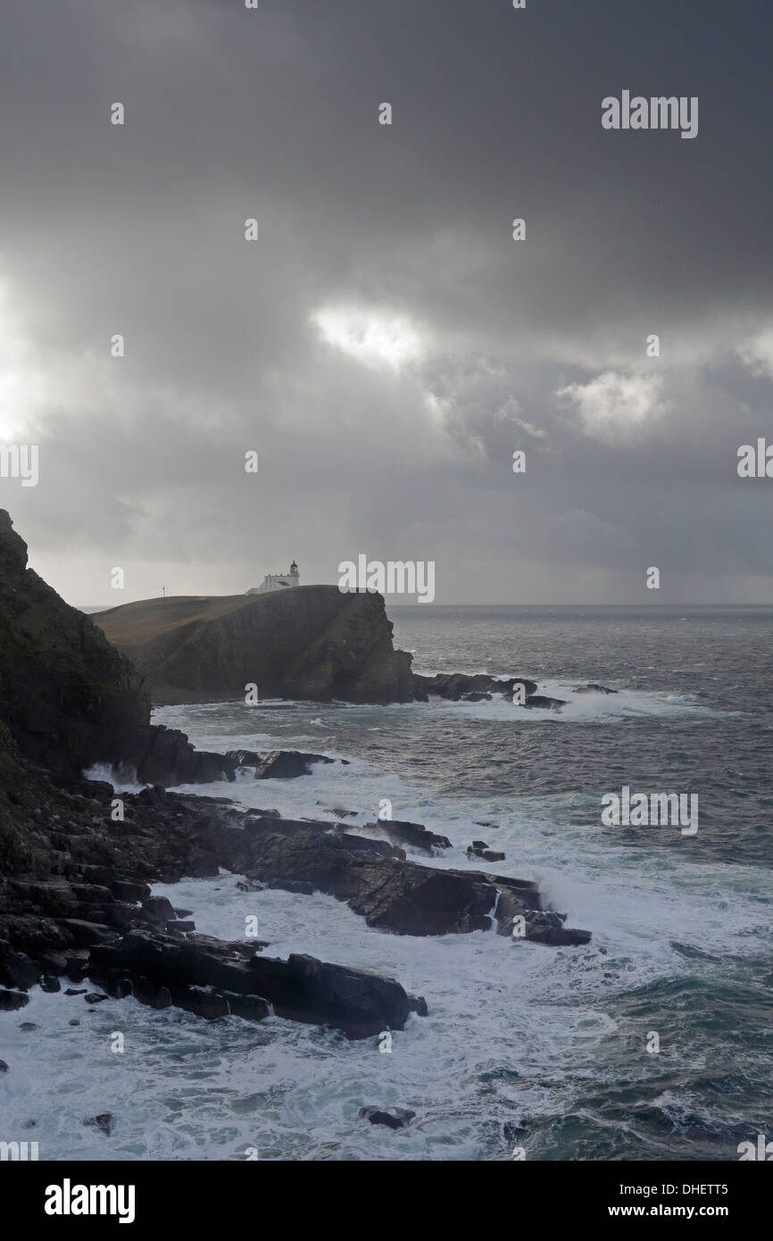 Stoer Lighthouse and coast in a storm Stock Photo