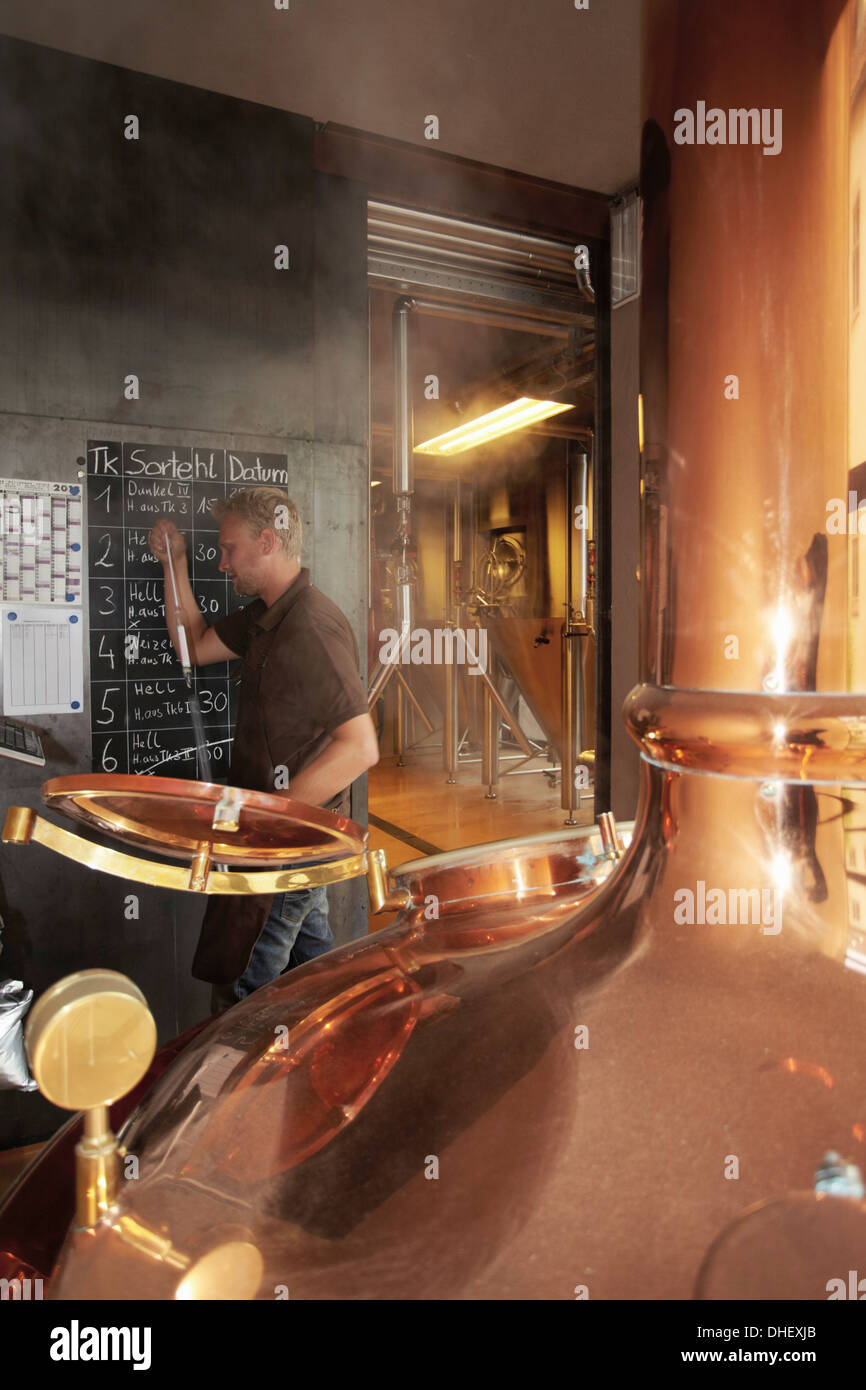Man working at brewery Stock Photo