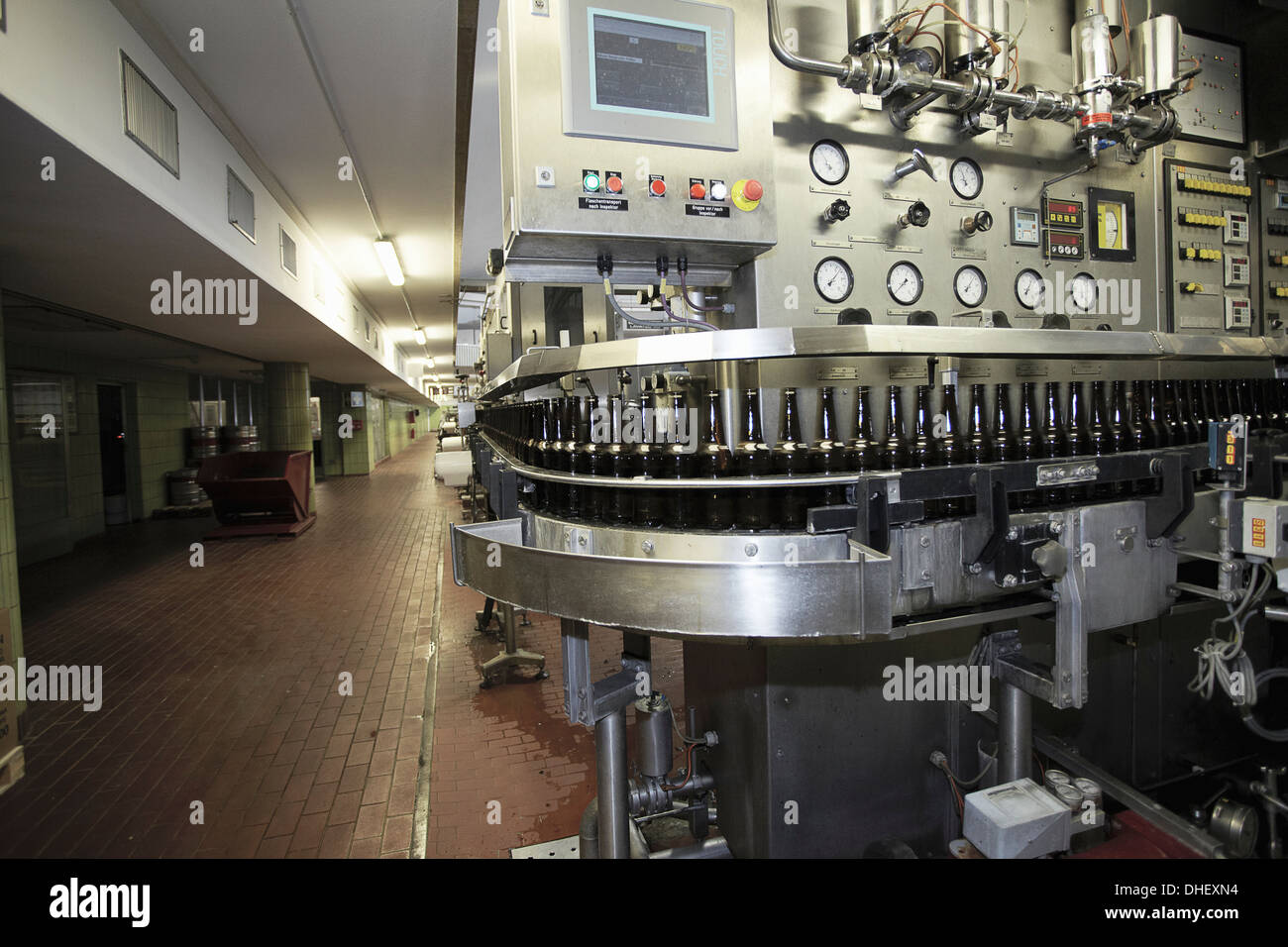 Beer bottling machine in brewery Stock Photo