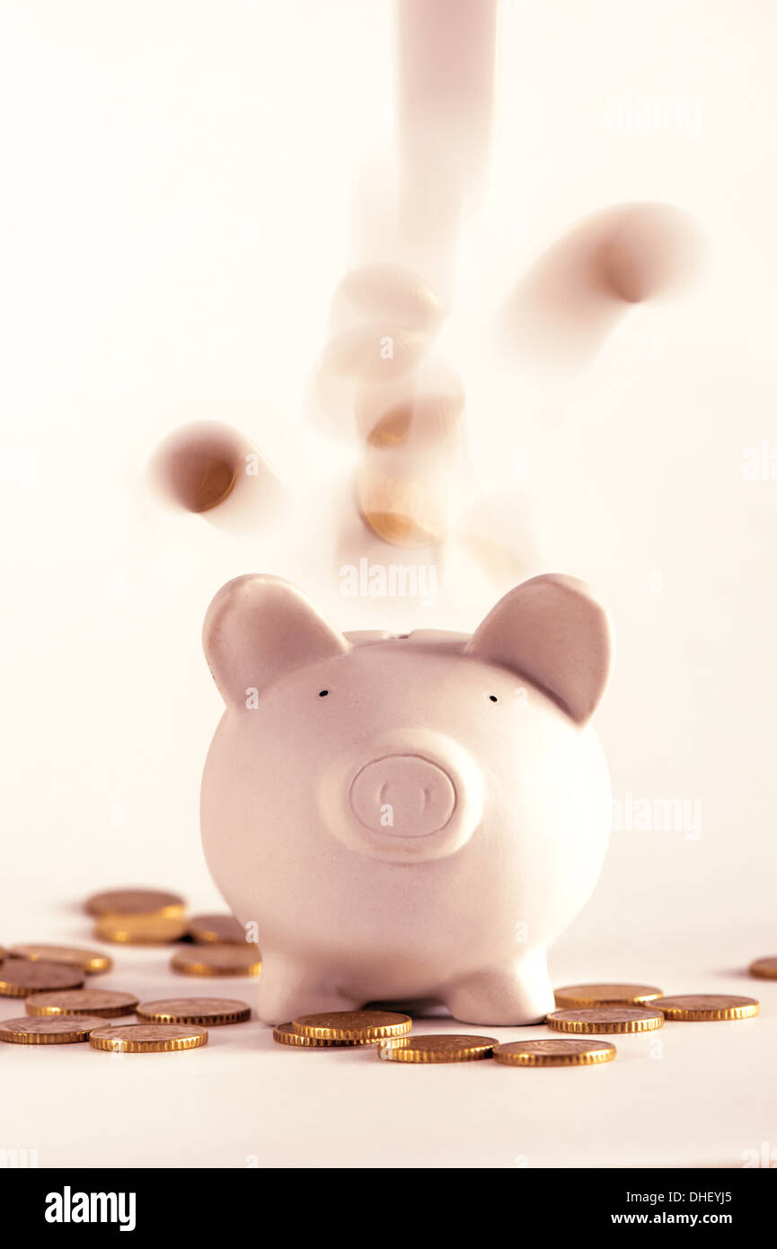 pig money box with golden coins Stock Photo