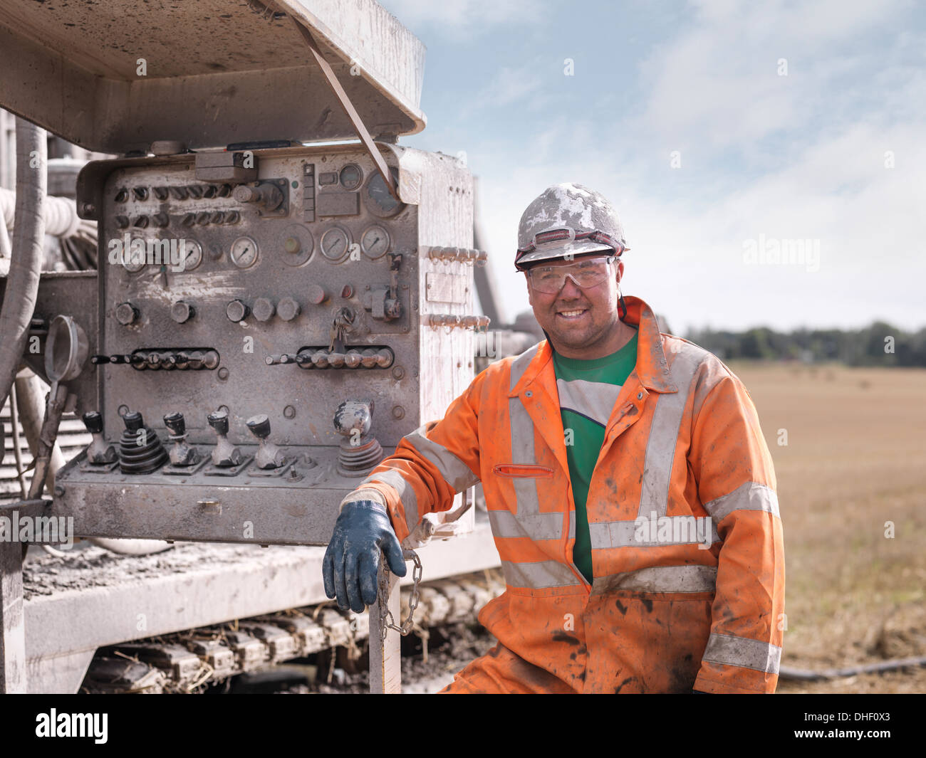 Portrait of drilling rig worker in hard hat and workwear Stock Photo