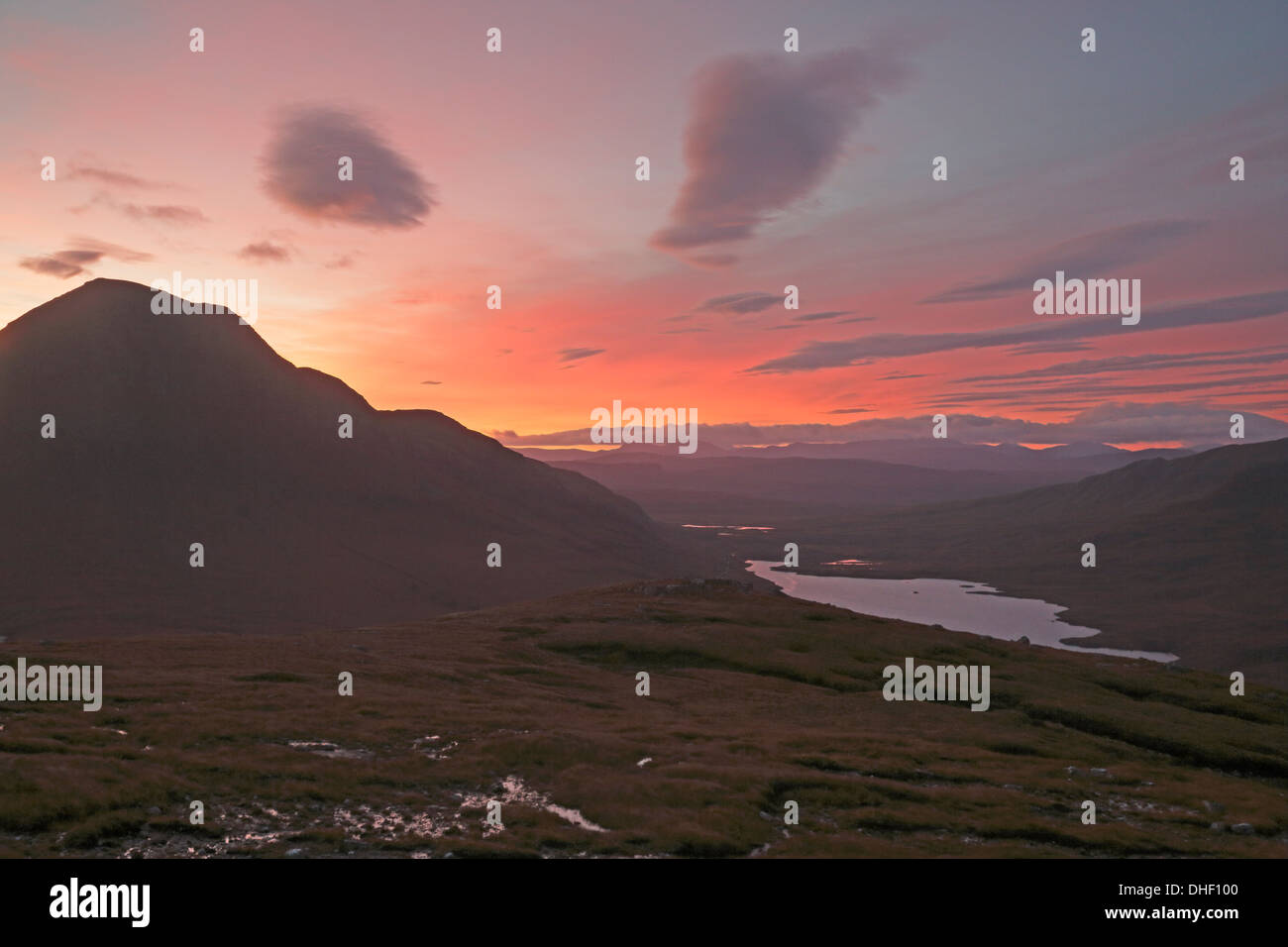 Sunrise over Cul Beag and Loch Lurgainn from Stac Pollaidh Stock Photo
