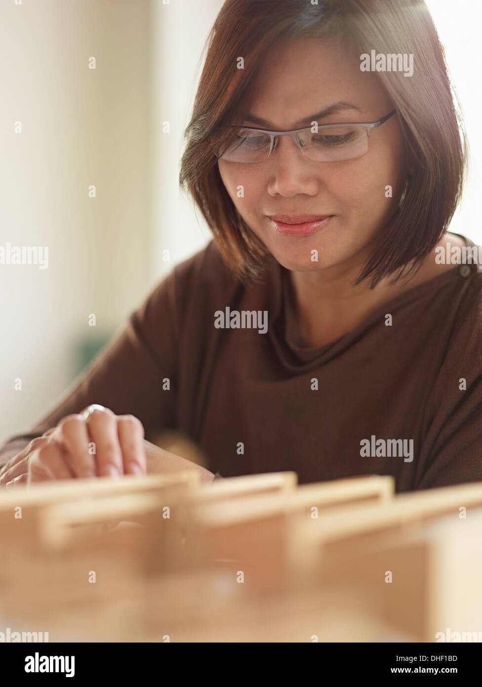 Female architect with model Stock Photo