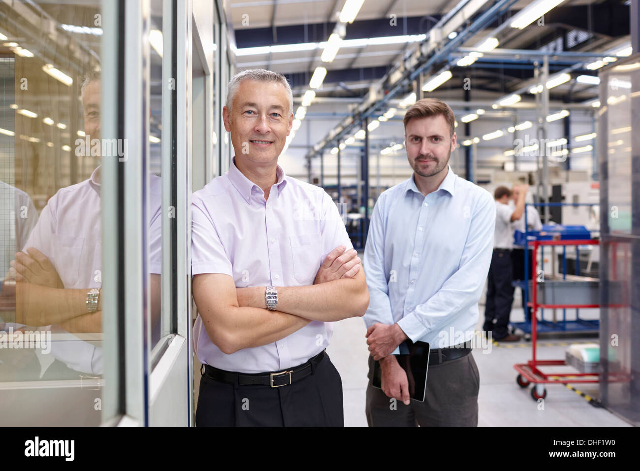 Portrait of engineers in engineering factory Stock Photo