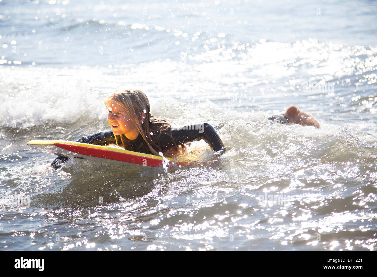 Lying down on surfboard hires stock photography and images Alamy