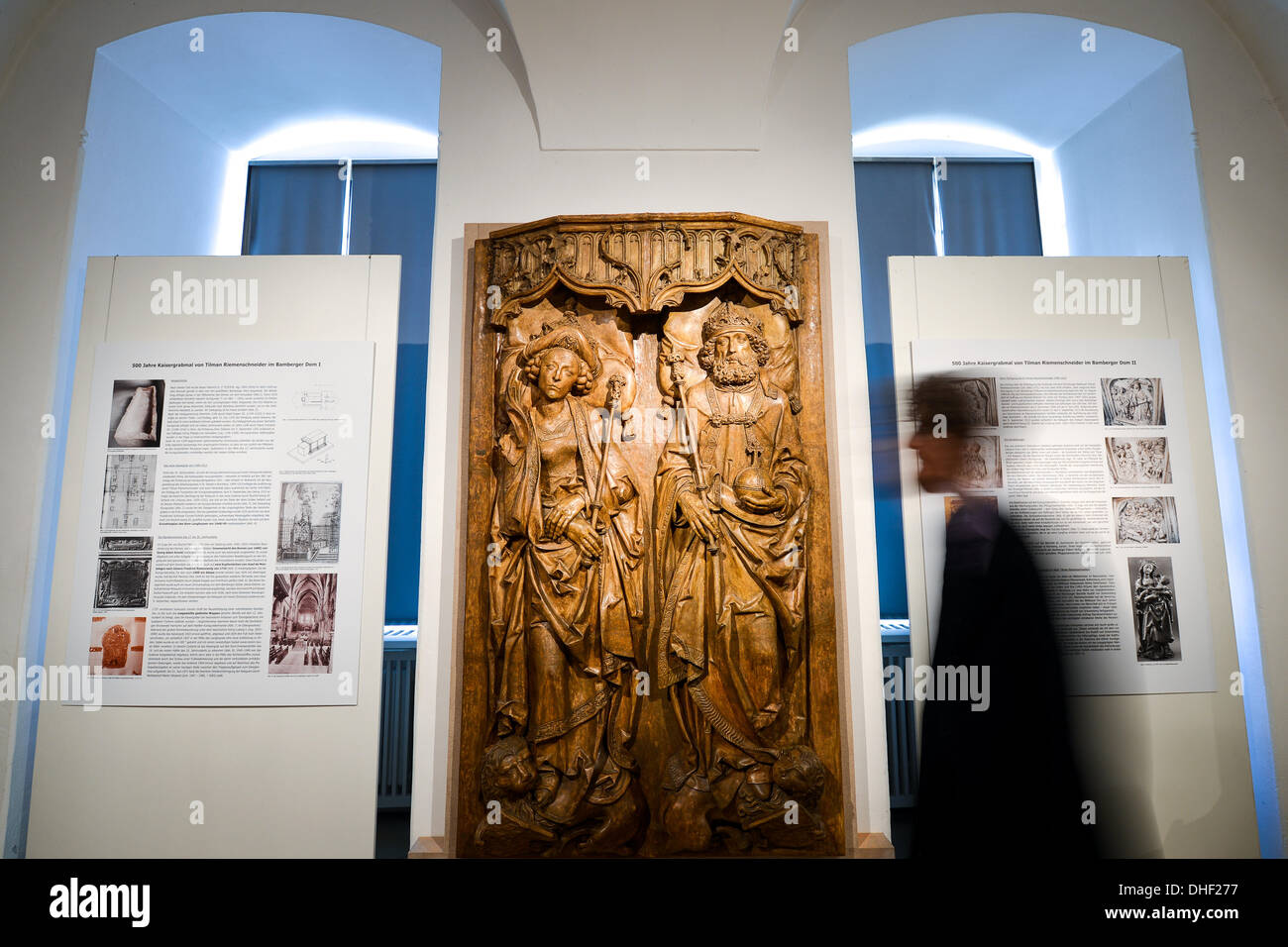 Bamberg, Germany. 07th Nov, 2013. Museum manager Holger Kempkens walks past a cast of the cover of a gravestone for Heinrich II and his wife Kunigunde made by Tilman Riemenschneider around 1500 in the exihibition '500 years Bamberg emperor grave' in the Diocese Museum in Bamberg, Germany, 07 November 2013. The special exhibition focusses on the marble artwork from 500 years ago. Photo: David Ebener/dpa/Alamy Live News Stock Photo