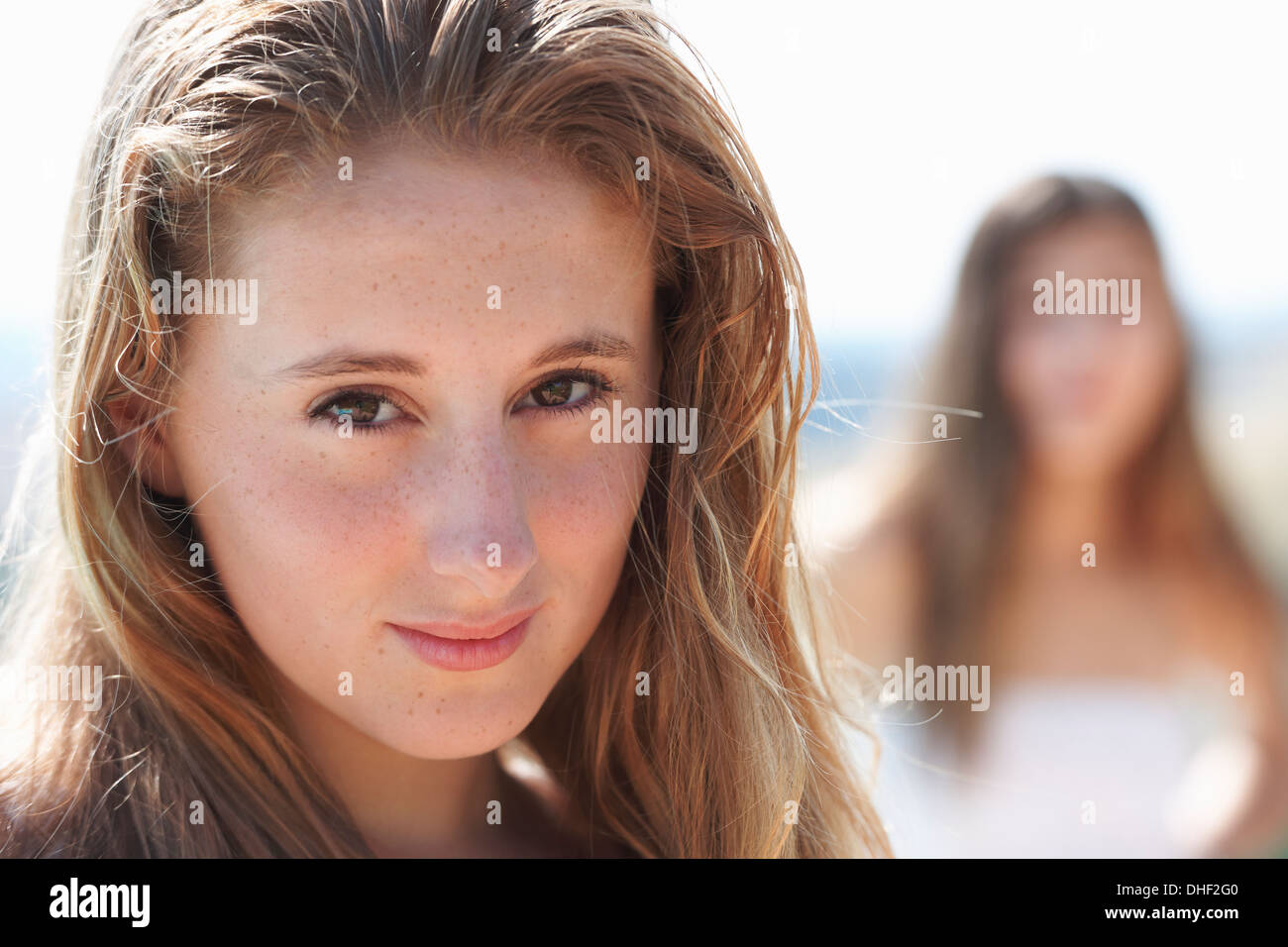 Portrait of teenage girl, focus on foreground Stock Photo