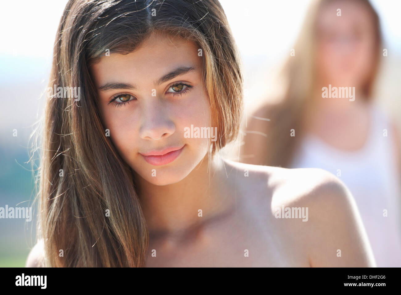 Portrait of teenage girl, focus on foreground Stock Photo