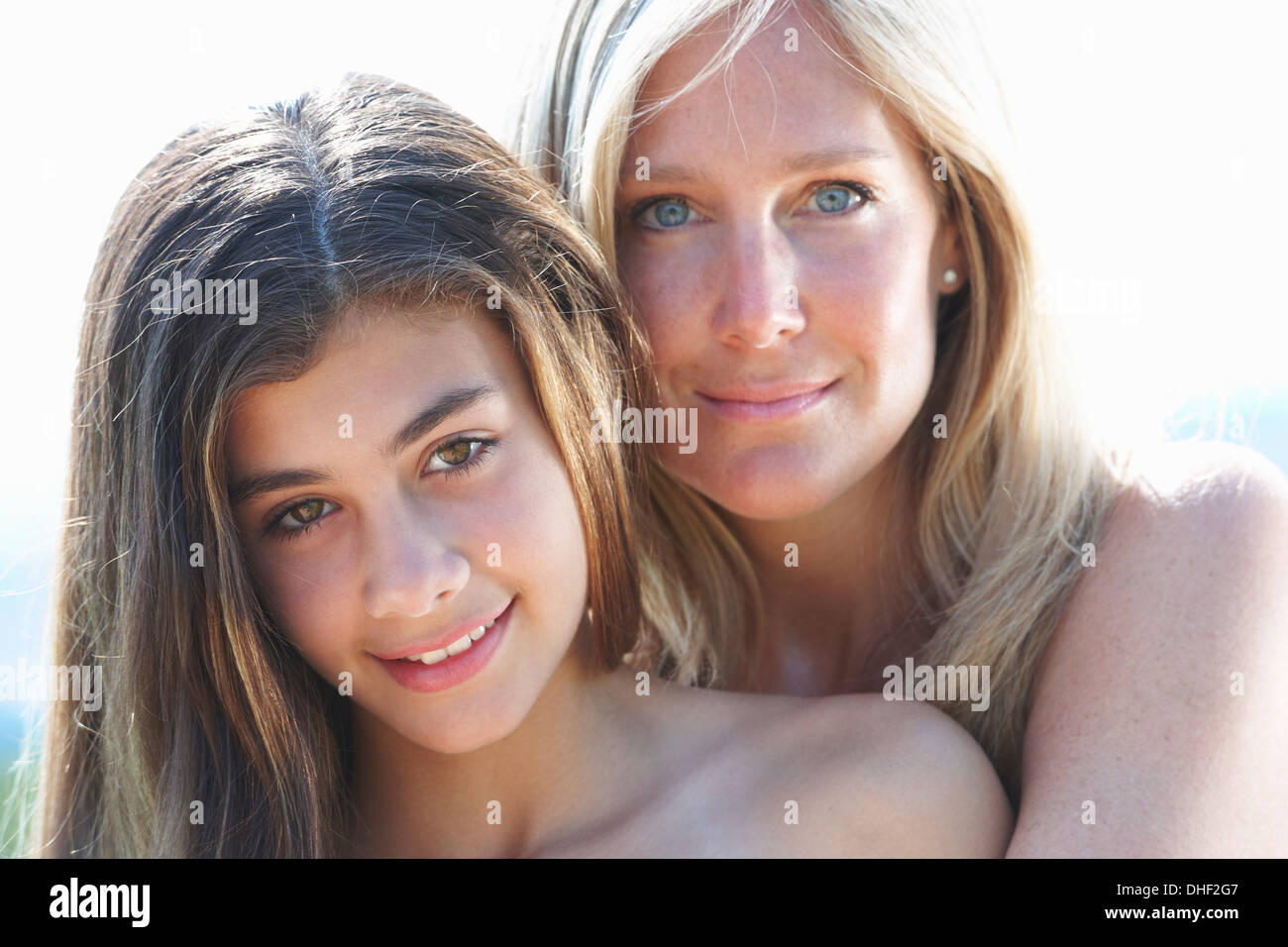 Mother looking at her teenage daughter hi-res stock photography and
