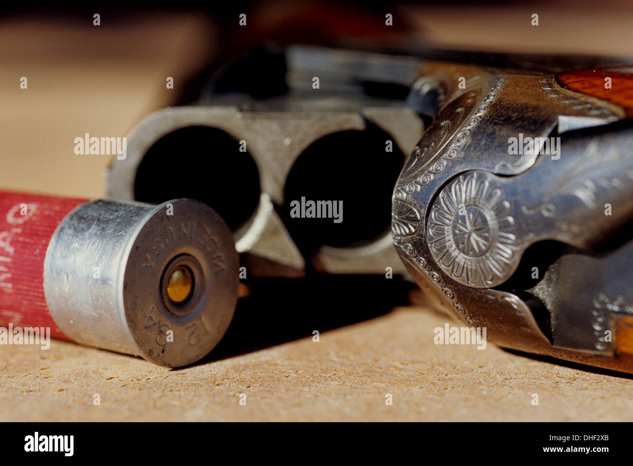 An over and under shotgun and shell used for dove and quail hunting