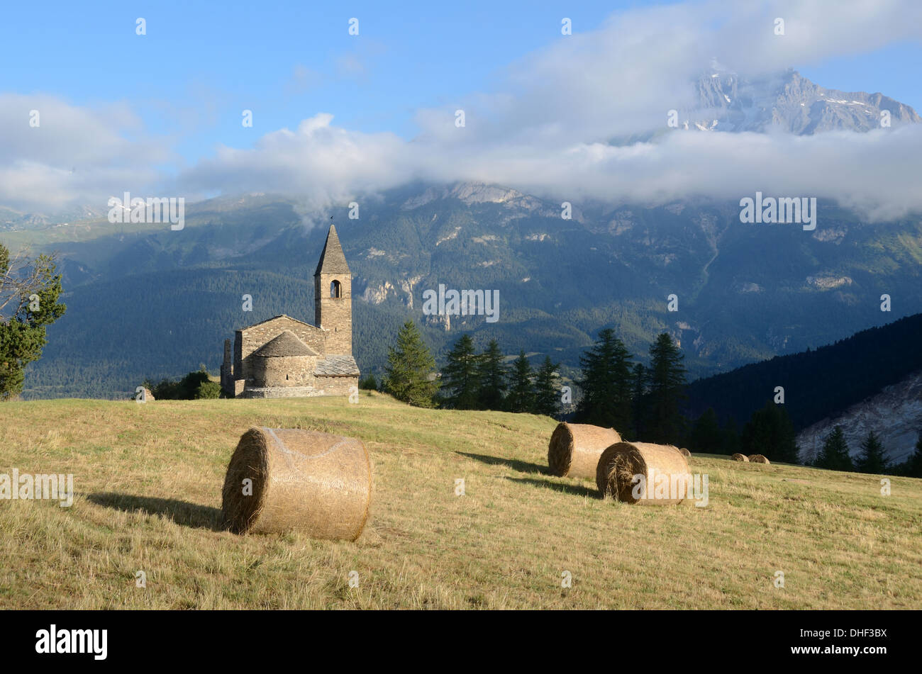 Church of St. Pierre Extavache & Landscape View over the Vanoise National Park Bramans Maurienne Valley Vanoise Savoie France Stock Photo