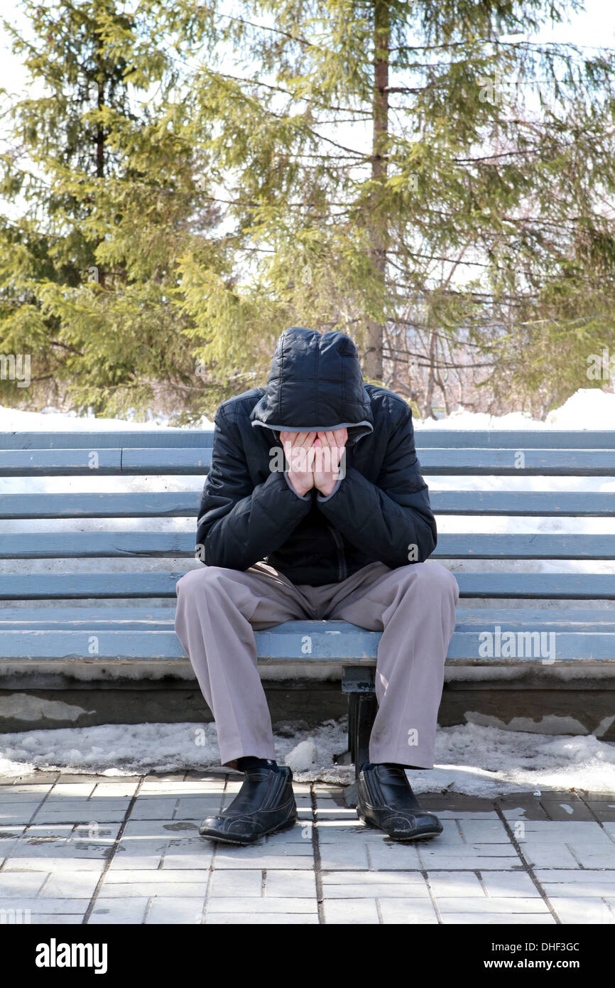 Sad man sitting on bench hires stock photography and images Alamy