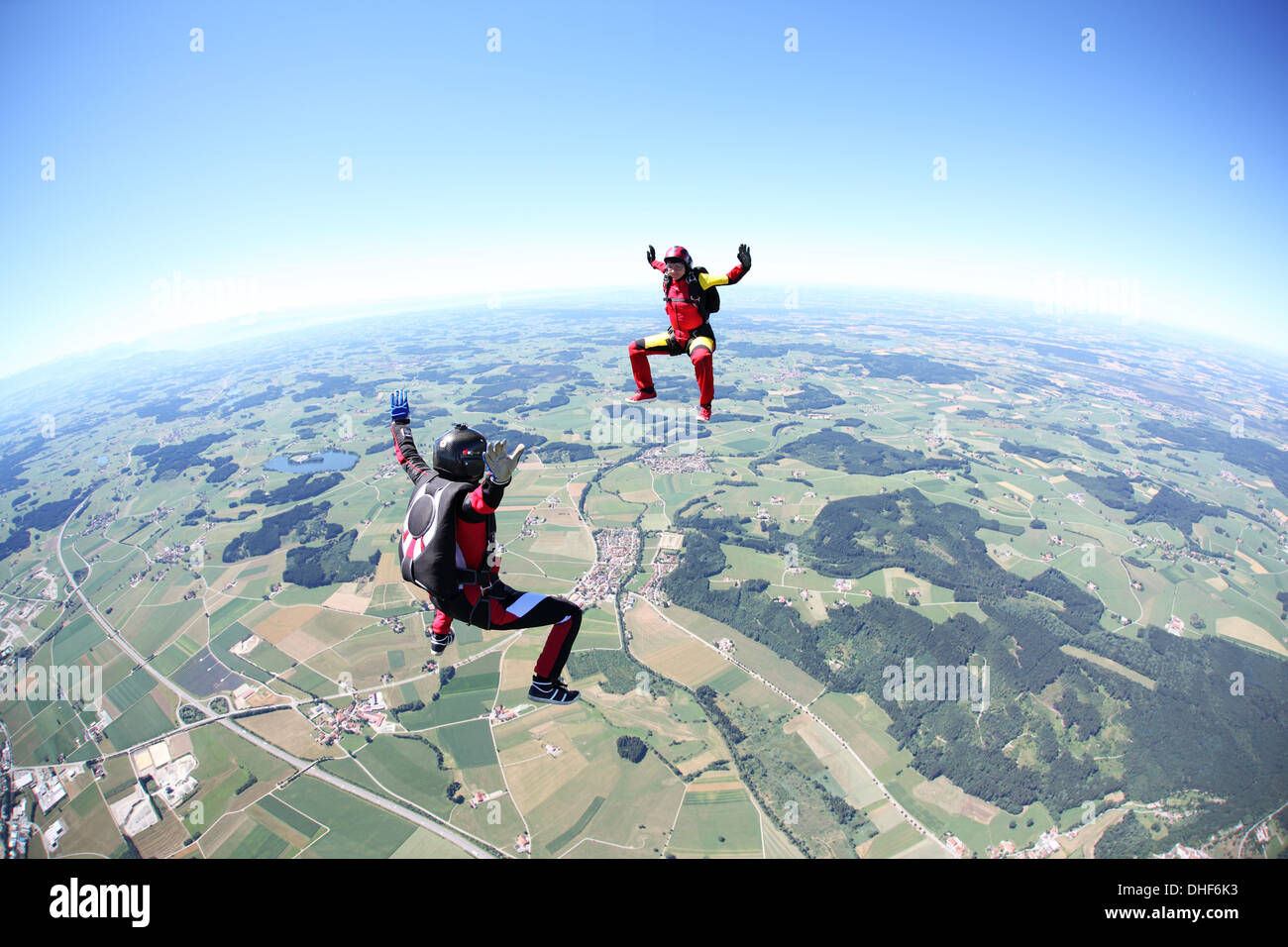 Skydivers having fun above Leutkirch, Bavaria, Germany Stock Photo