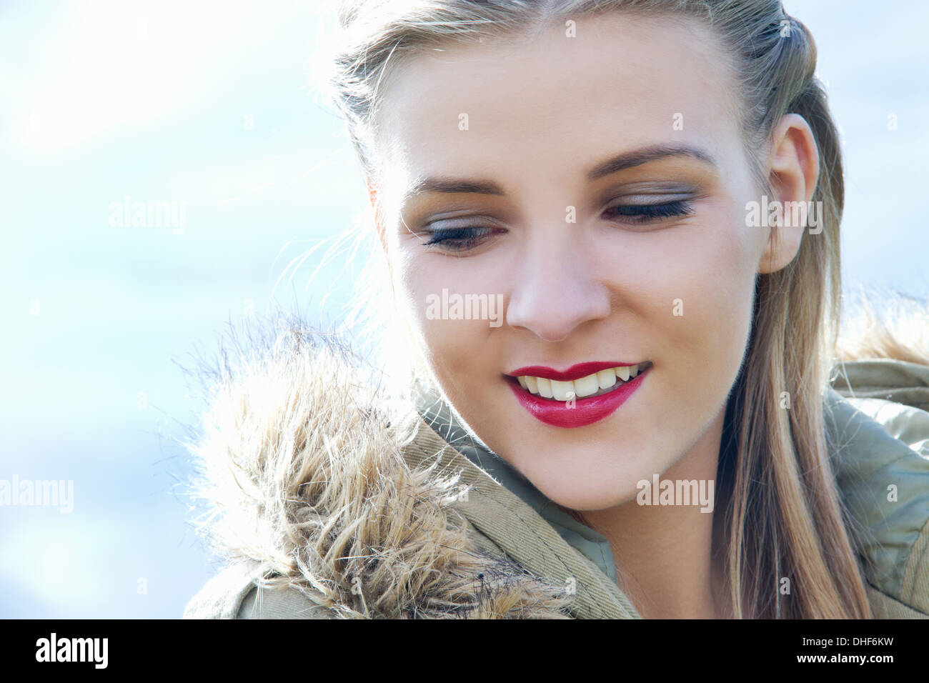 Close up portrait of young woman in parka Stock Photo