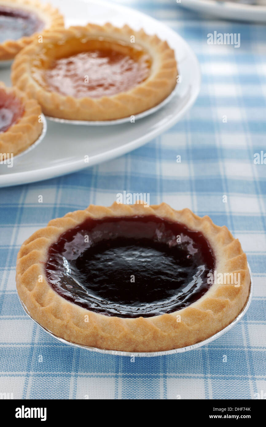 Blackcurrant jam tart and other tarts Stock Photo