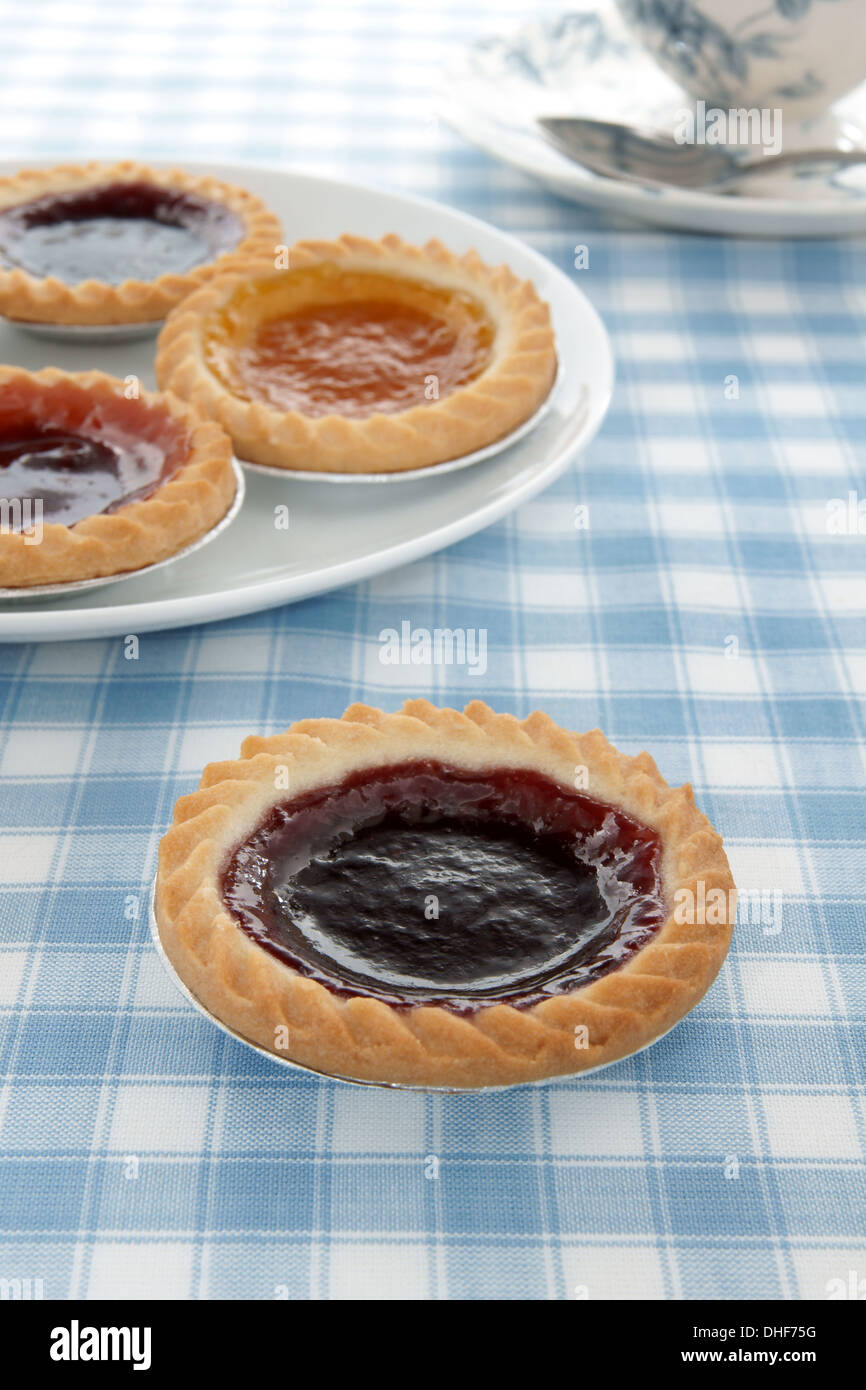 Blackcurrant jam tart and other tarts Stock Photo