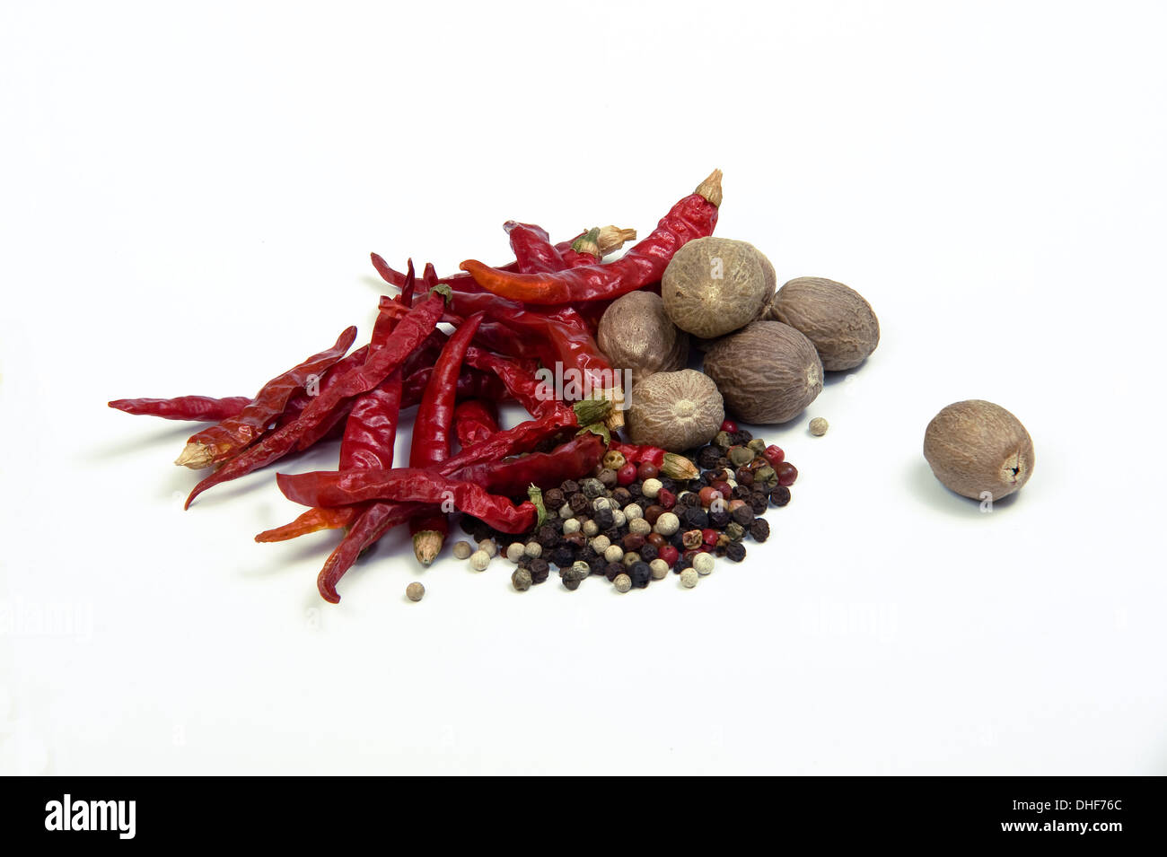 Peppers and nutmegs Stock Photo