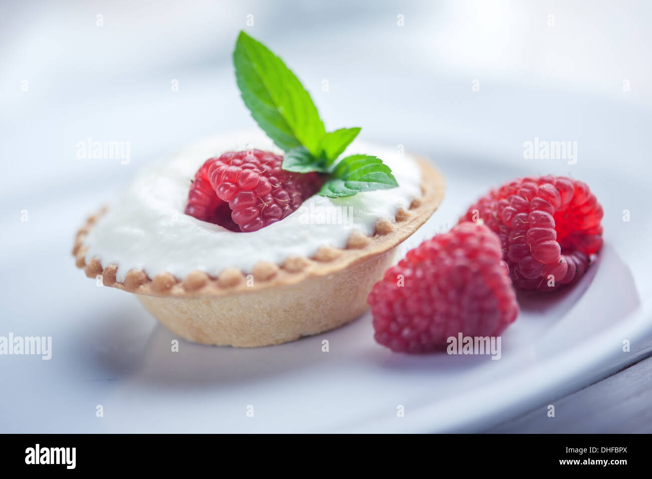 Mint Raspberry Dessert raspberry cake with mint twig Stock Photo - Alamy