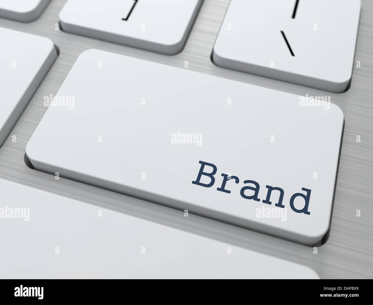 White Keyboard with Brand Button. Stock Photo