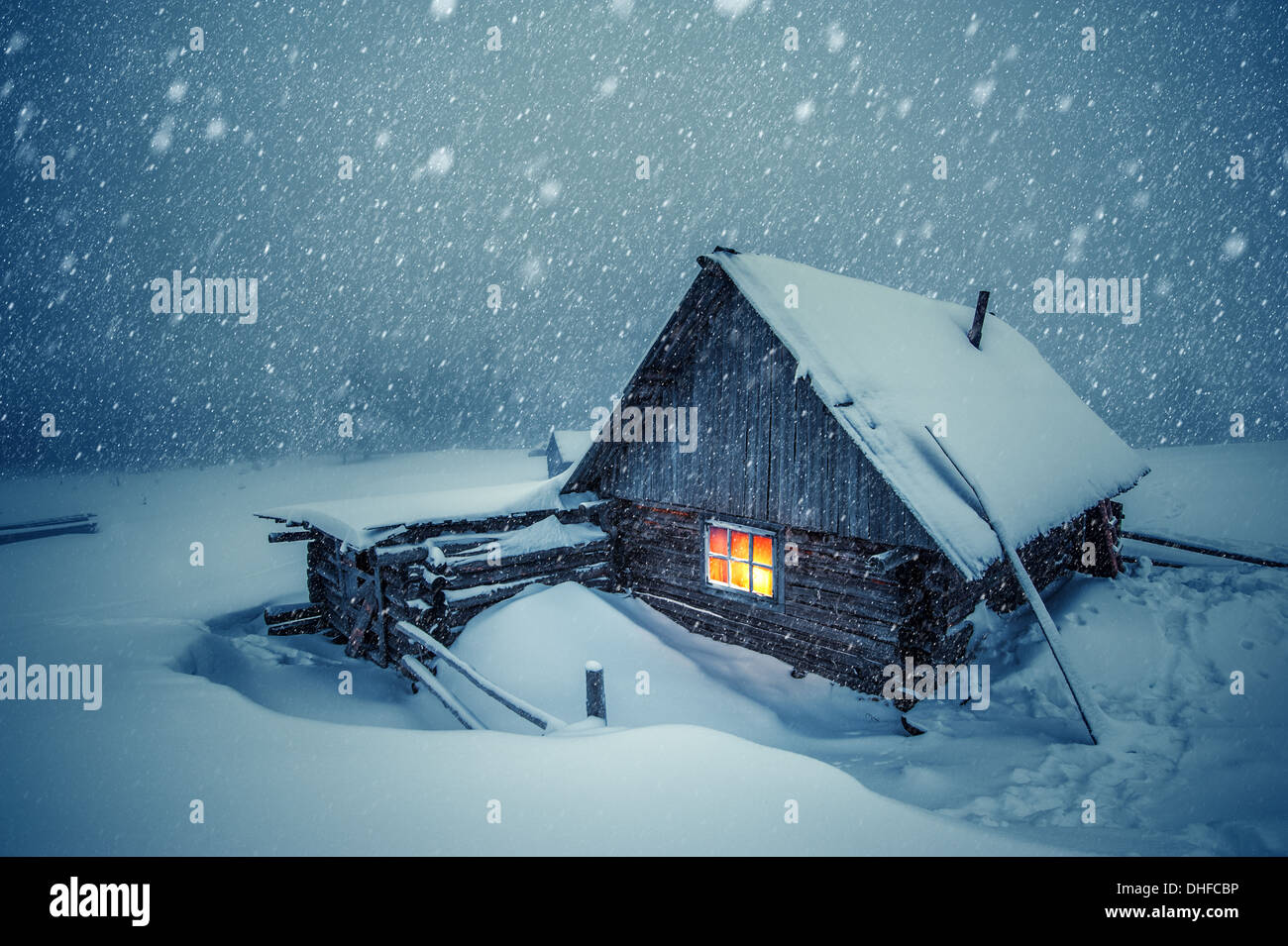 wooden house in winter forest Stock Photo - Alamy