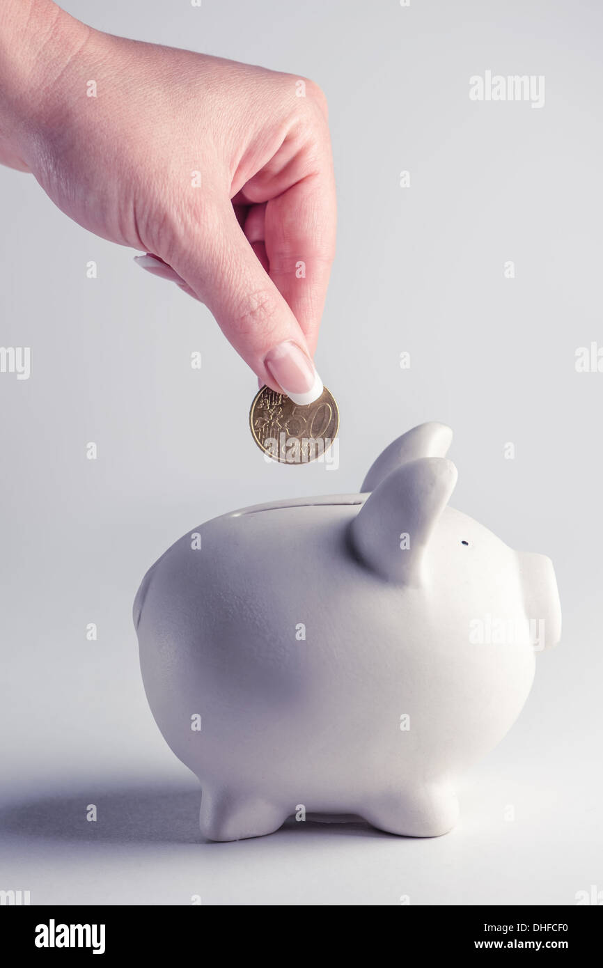 pig money box with golden coin Stock Photo