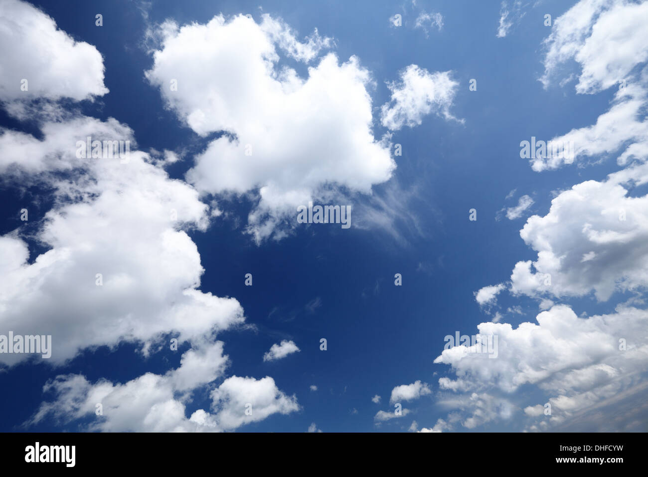 Deep blue sky background with white clouds Stock Photo - Alamy