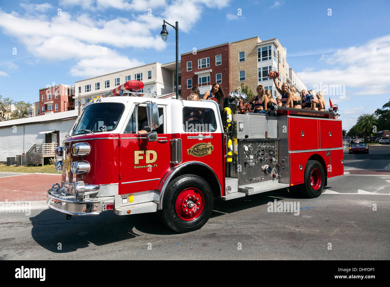 Florida cheer leaders squad riding on a fire truck in the University of ...