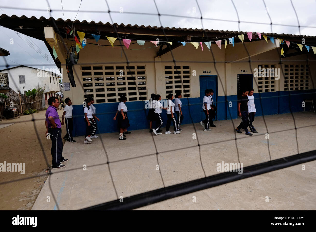 Schoolchildren in Carti Sugtupu island village administered by Guna natives known as Kuna in the 'Comarca' (region) of the Guna Yala located in the archipelago of San Blas Blas islands in the Northeast of Panama facing the Caribbean Sea. Stock Photo