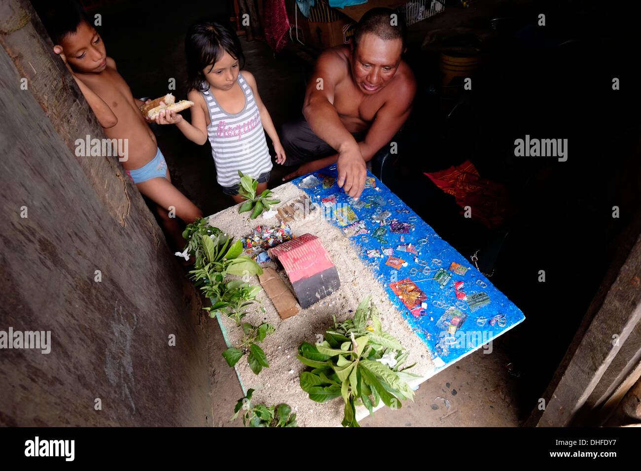 A Guna Yala man explains how waste is negatively impacting water quality.at his home in Carti Sugtupu island village administered by Guna natives known as Kuna in the 'Comarca' (region) of the Guna Yala located in the archipelago of San Blas Blas islands in the Northeast of Panama facing the Caribbean Sea. Stock Photo