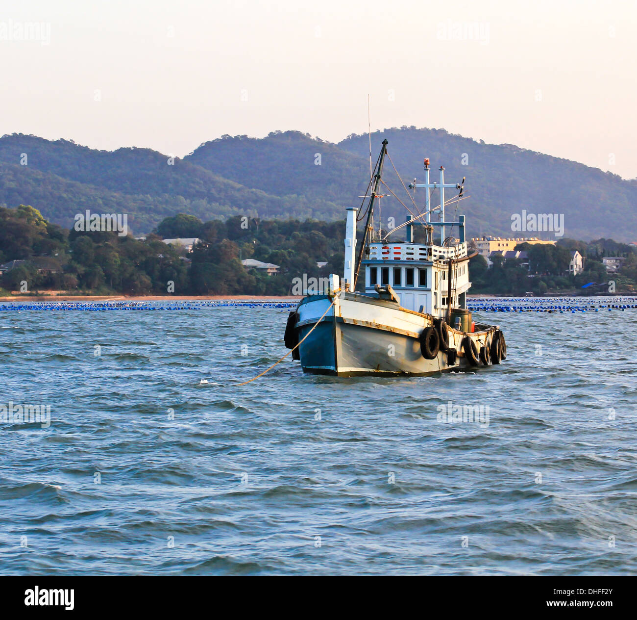 Wooden fishing boat on sea Stock Photo - Alamy