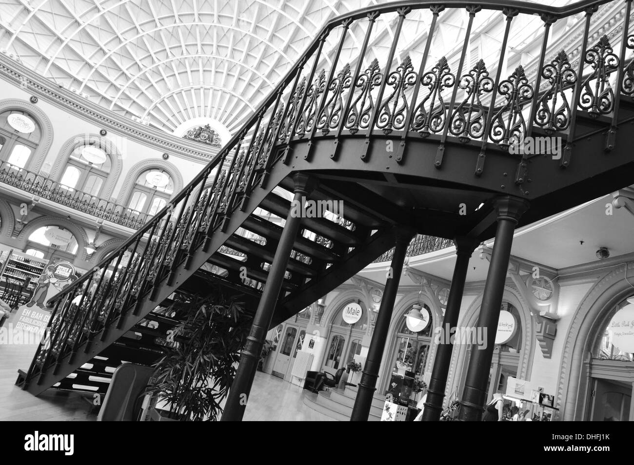 A monochrome of a Victorian architectural staircase built in wrought iron at the Corn Exchange, Leeds, West Yorkshire Stock Photo