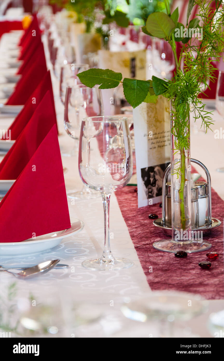 festive dinner table in red Stock Photo