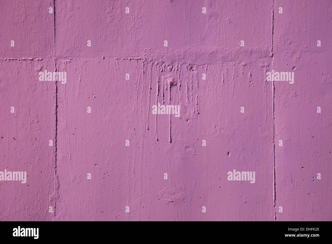 colored concrete wall painted background violet Stock Photo