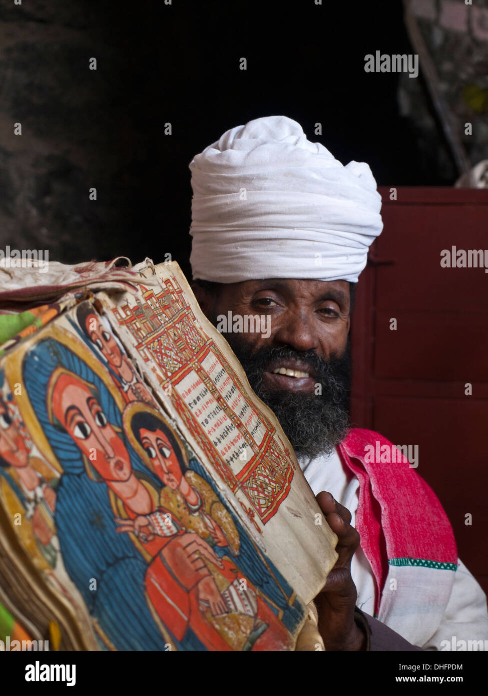 Ethiopian Orthodox Priest with illustrated Bible Stock Photo