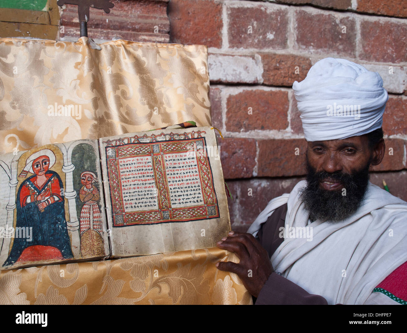 Ethiopian Orthodox Priest with illustrated Bible Stock Photo