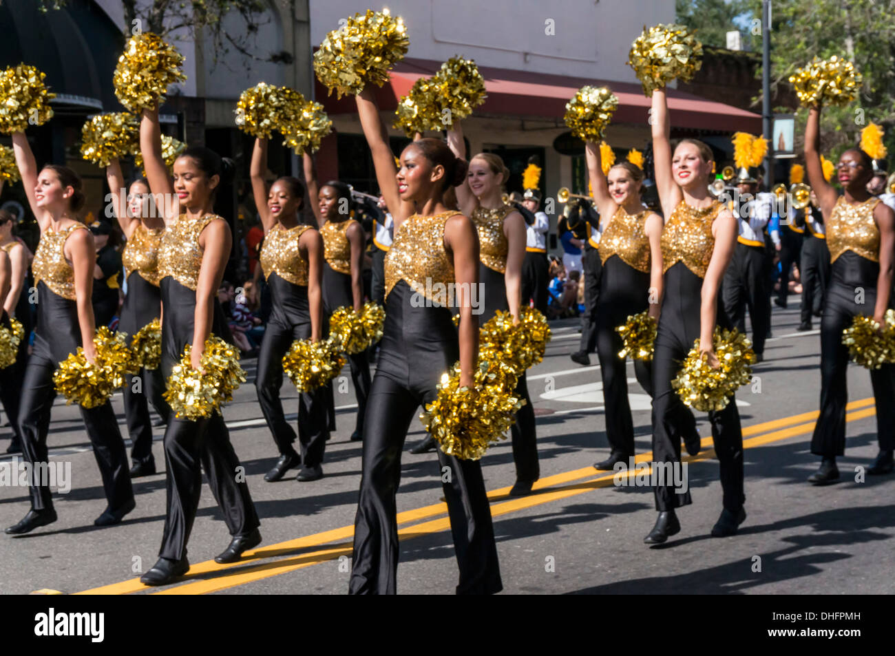 Buchholz High School marching band majorettes, yellow and black with