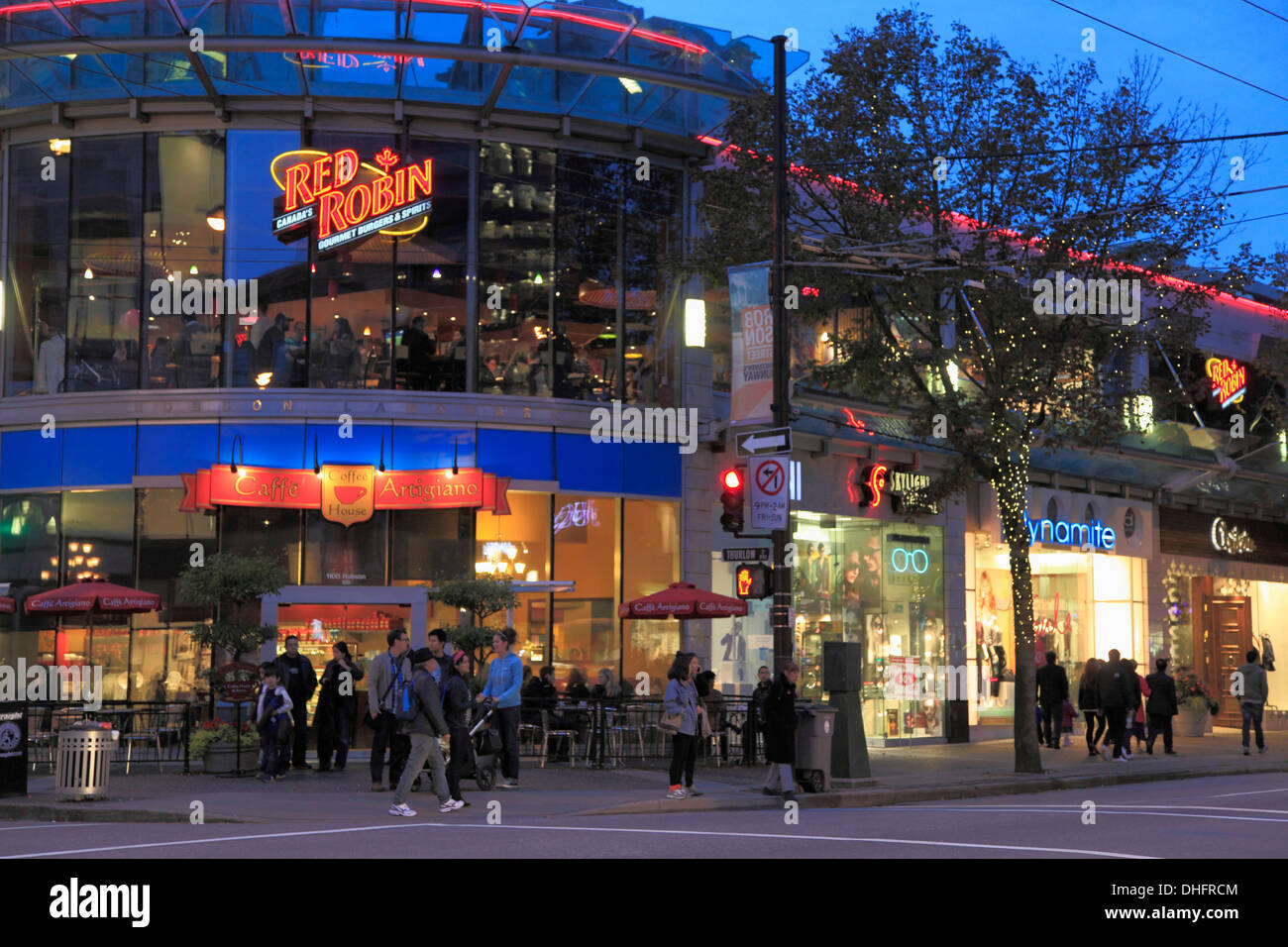 Busy night time shoppers and traffic, Robson Street, Vancouver