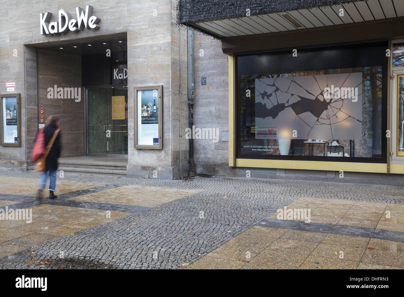 Kristallnacht, Berlin 9 November 2013. On the 75th anniversary of Kristallnacht (or Night of broken windows), a night of violence against Jews and their property, around 100 shops in Berlin display window stickers showing broken glass. Here, KaDeWe, one of Berlins leading stores displays the stickers. Credit:  Julie g Woodhouse/Alamy Live News Stock Photo