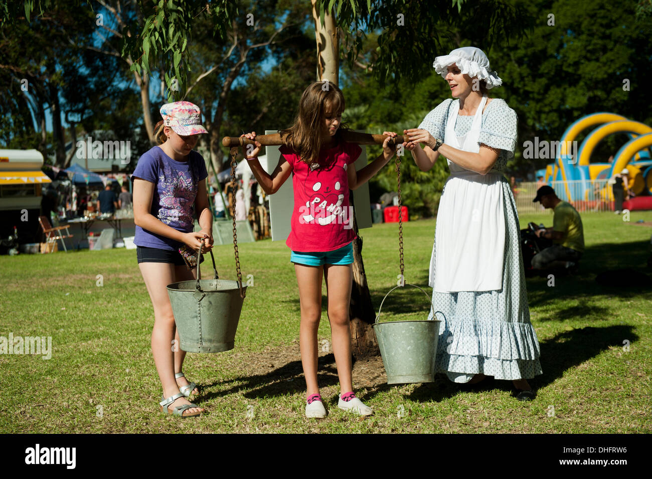 Carrying buckets of water hires stock photography and images Alamy