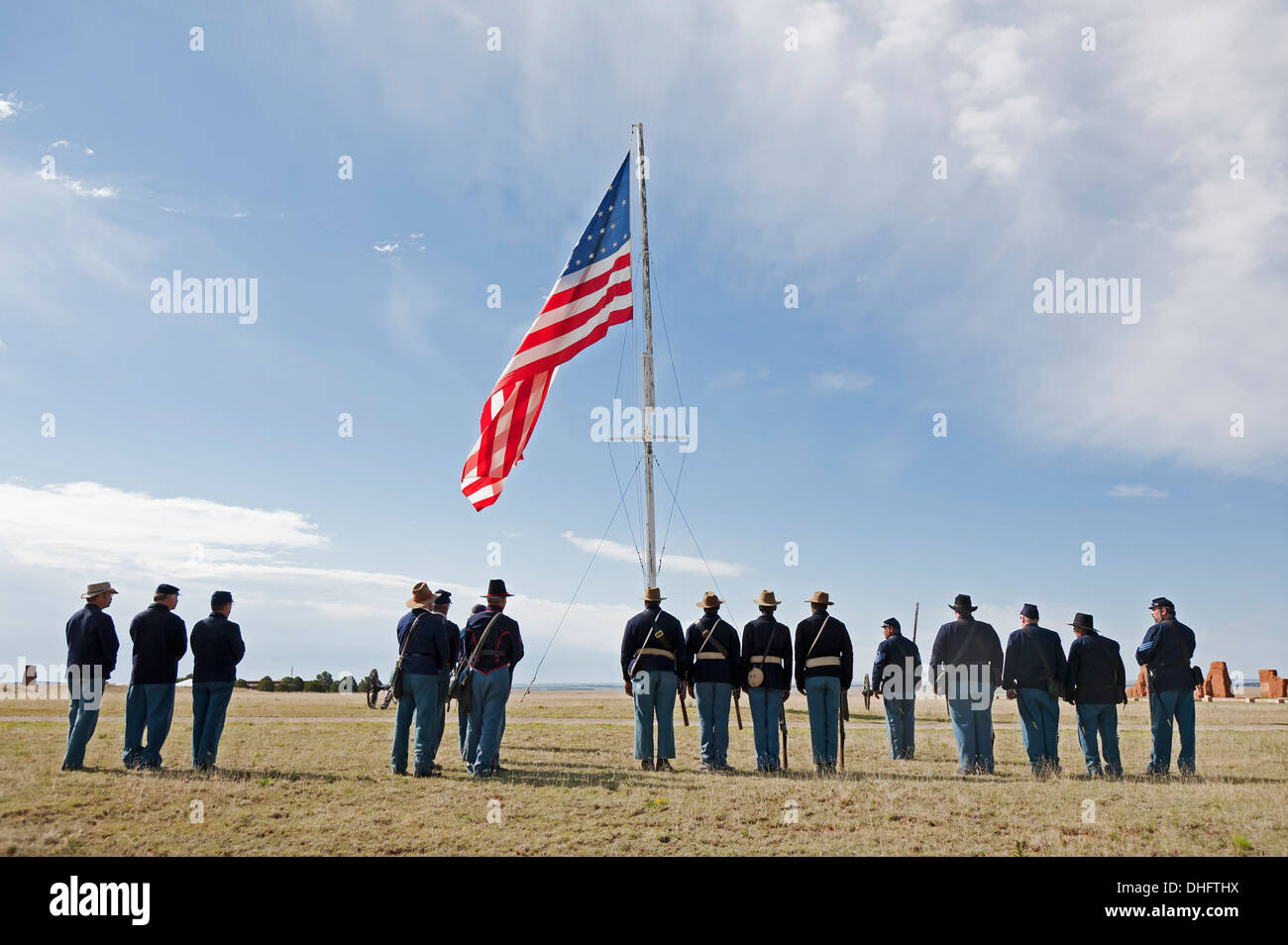 Civil War Era Union soldier reenactors at attention during flag-raising ceremony, Fort Union National Monument, New Mexico US Stock Photo