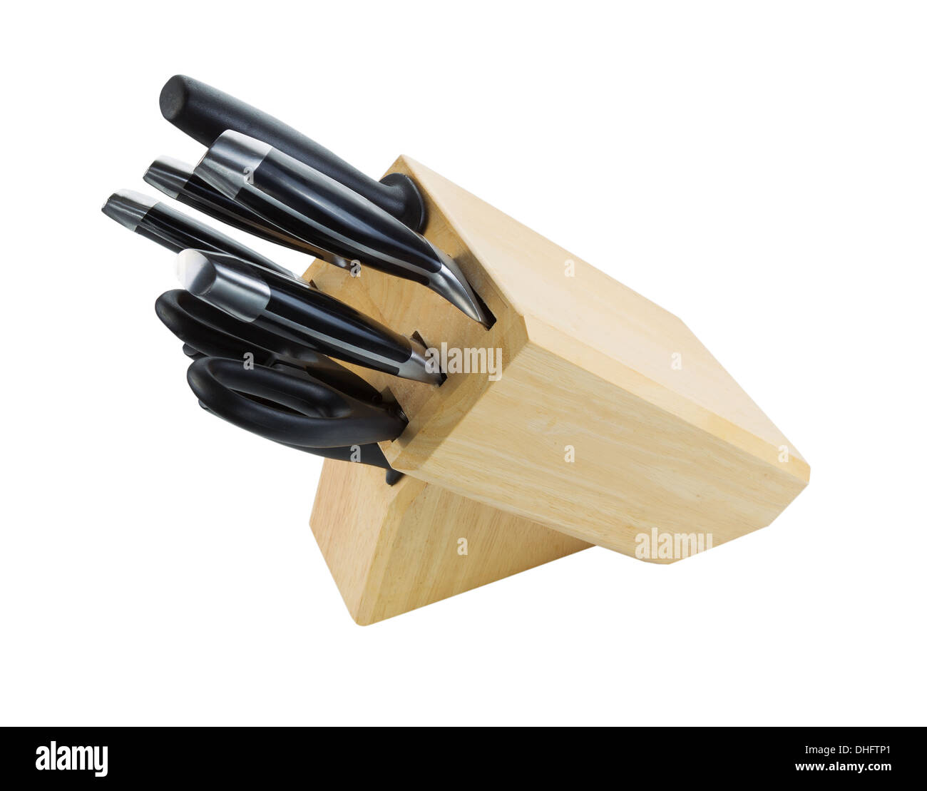 Photo of kitchen knives, scissors and sharpener in wooden holder isolated on white Stock Photo