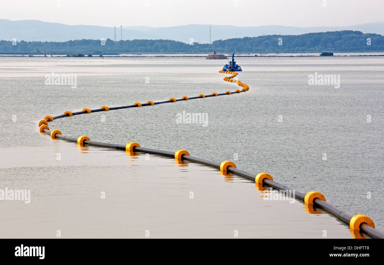 water excavator and the pipes Stock Photo