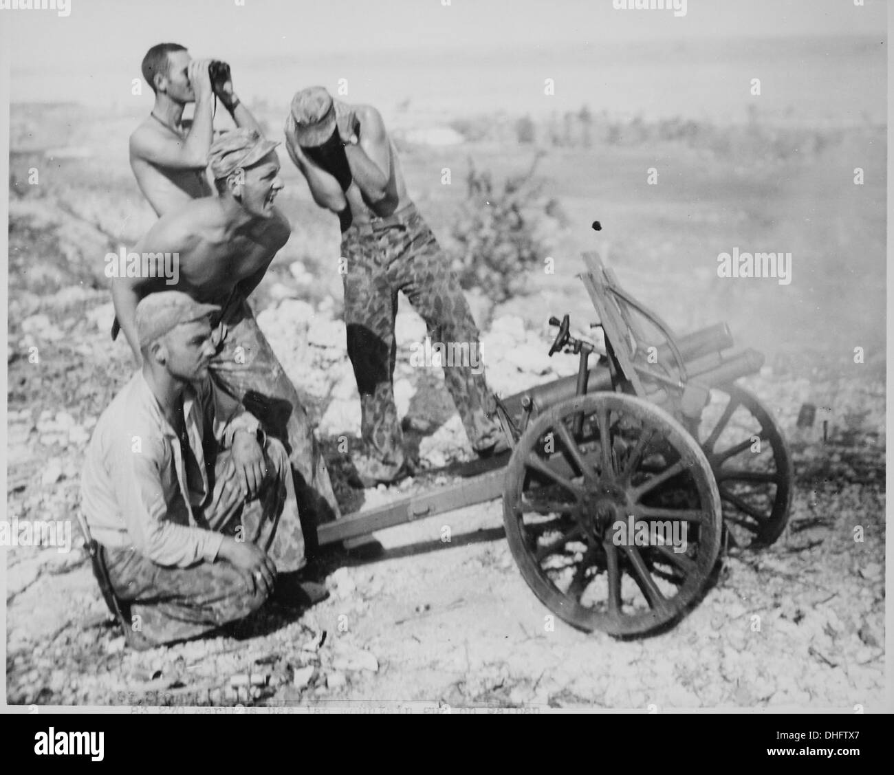 After the Marines captured this mountain gun from the Japs at Saipan, they put it into use during the attack on Garapan 383 Stock Photo