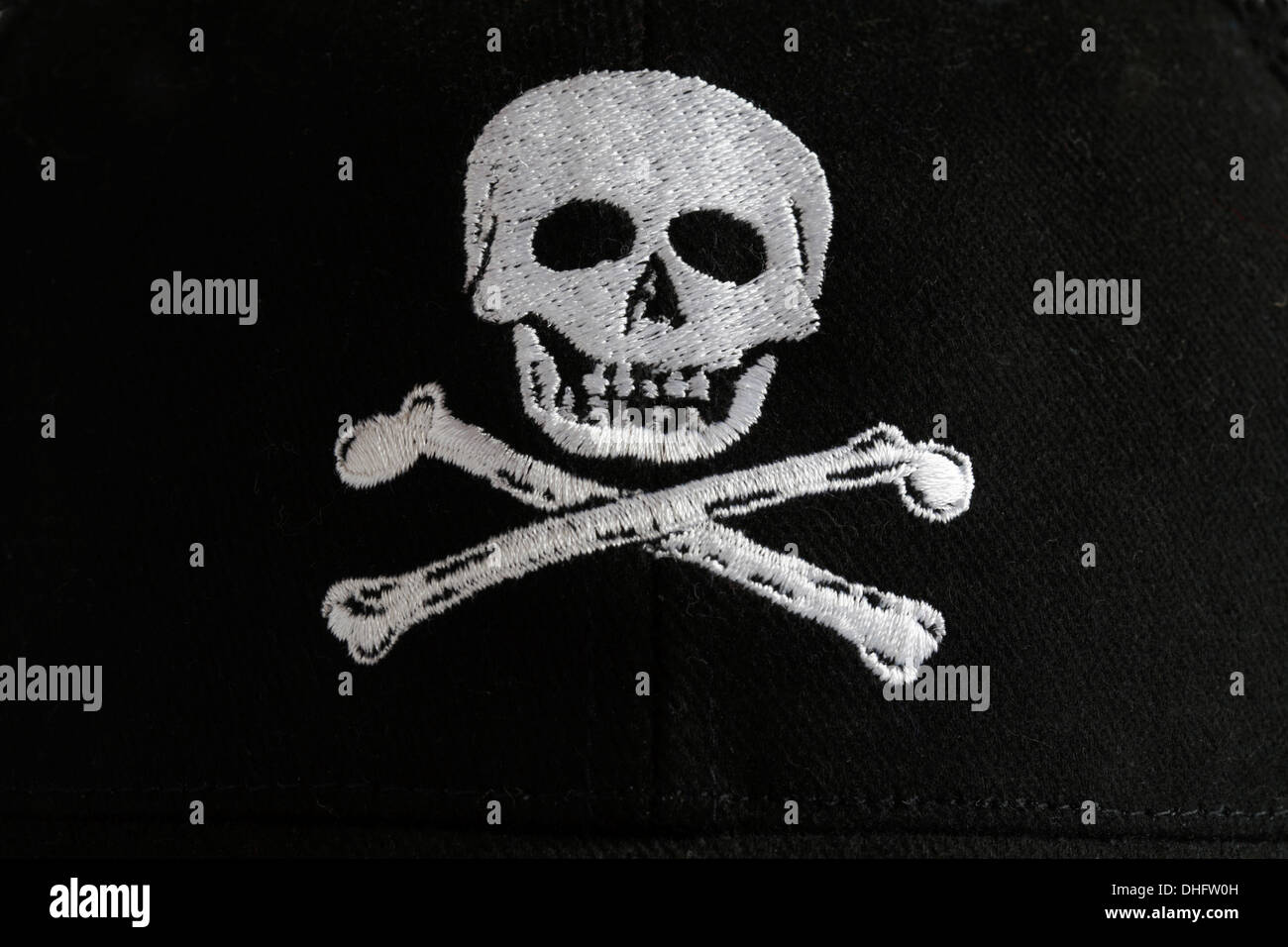 skull and crossbones detail on baseball cap Stock Photo Alamy