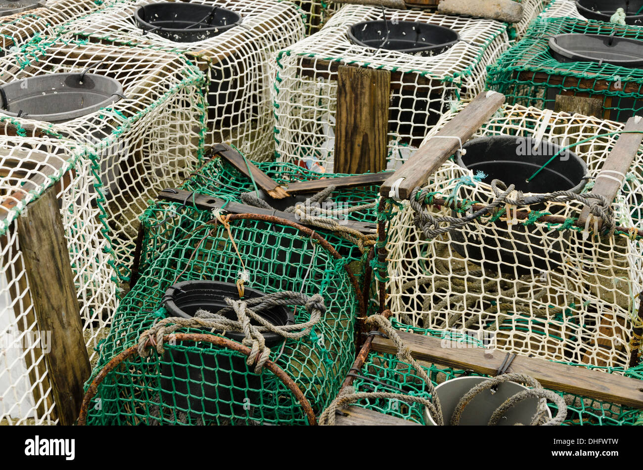 Several aligned Crabbing traps in a fishing port in northern Spain Stock Photo
