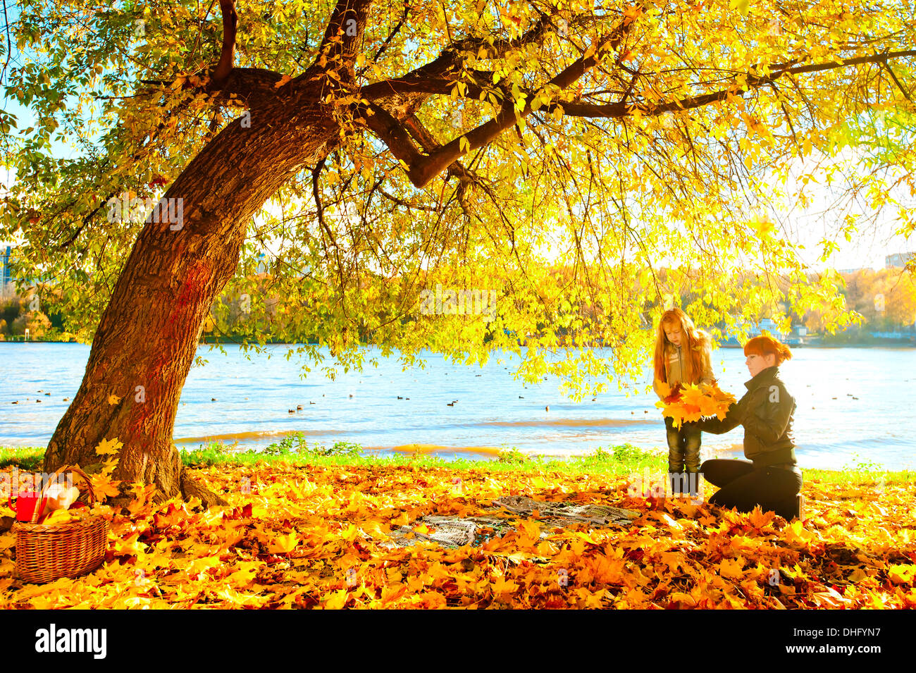Mother and daughter in the autumn nature Stock Photo