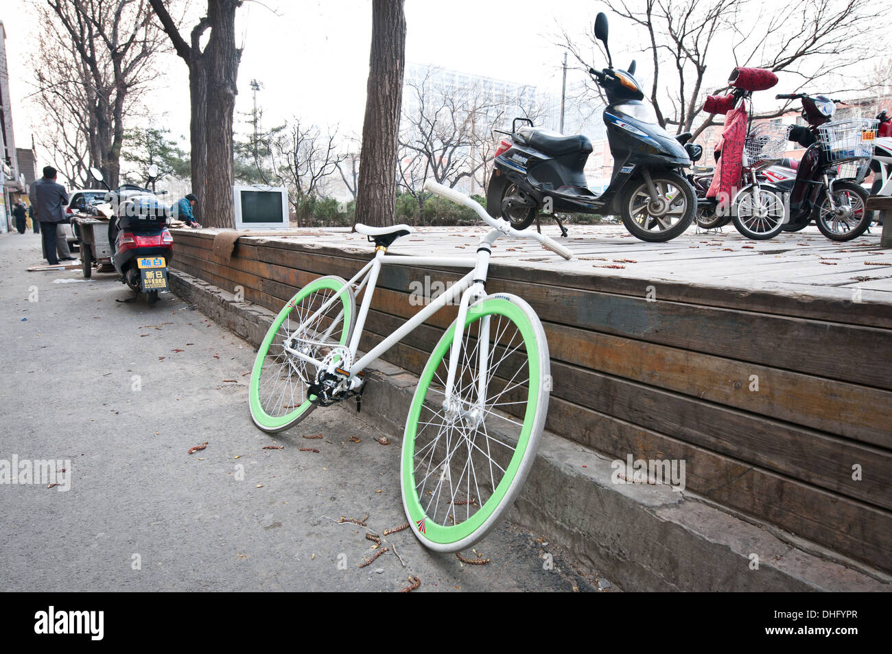 White bike with green wheels in Beijing, China Stock Photo
