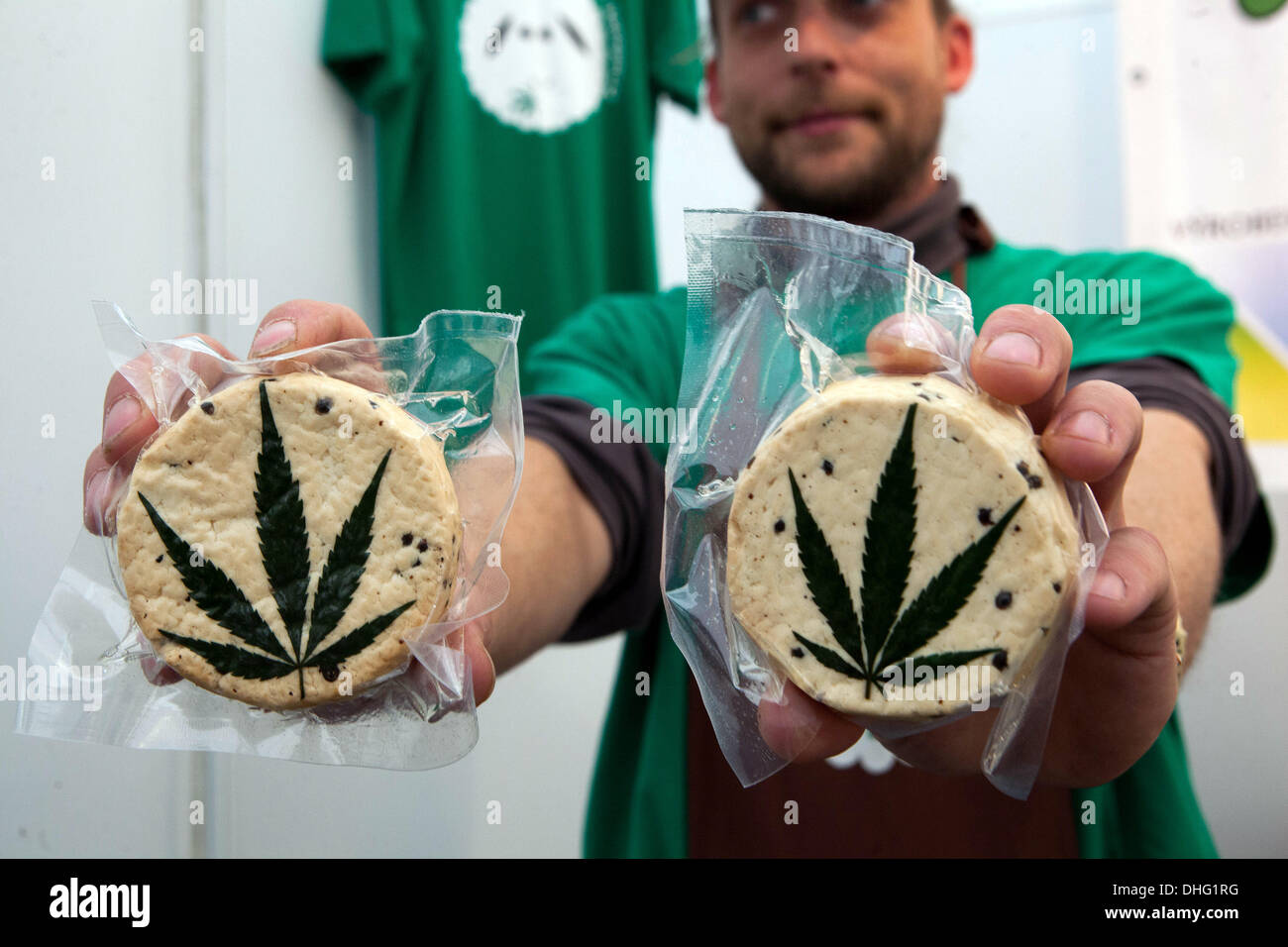 Sheep's cheese vacuum-packed, decorated with a cannabis leaf Prague Czech Republic Family farm product A man offers a product Stock Photo